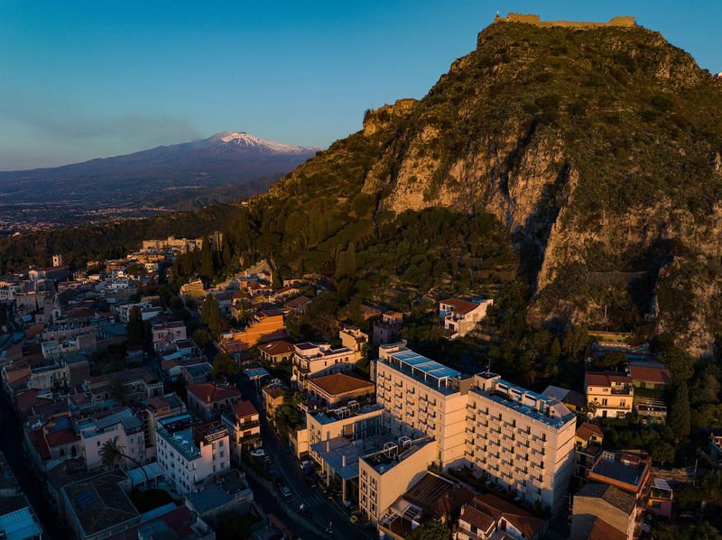 Taormina at dusk, Etna on the horizon