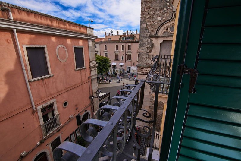 Looking down onto the Corso from a balcony
